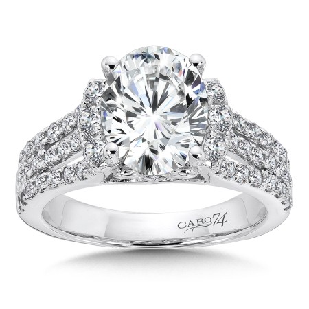Engagement Ring with Oval Shape Center and Split Shank With Side Stones