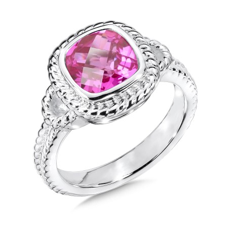 Sterling silver and created pink sapphire ring.