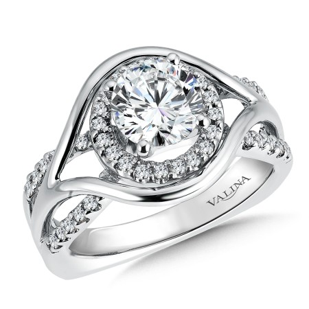 A distinct interwoven design makes this a halo engagement ring set in 14k white gold as unique as your love.