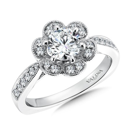 Floral shape diamond halo engagement ring set in 14k white gold.