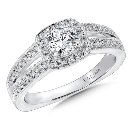 Split shank cushion-shaped diamond halo engagement ring in 14k white gold.