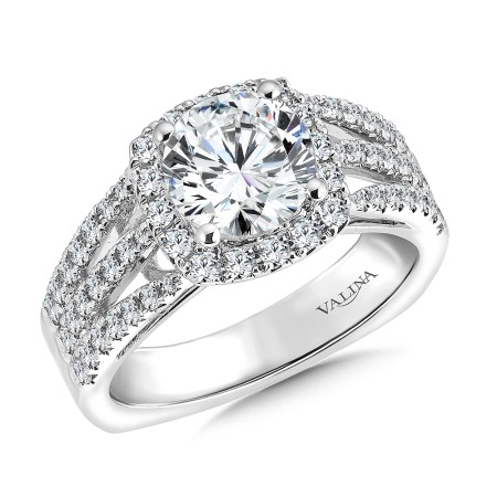 Diamond cushion-shaped halo engagement ring.